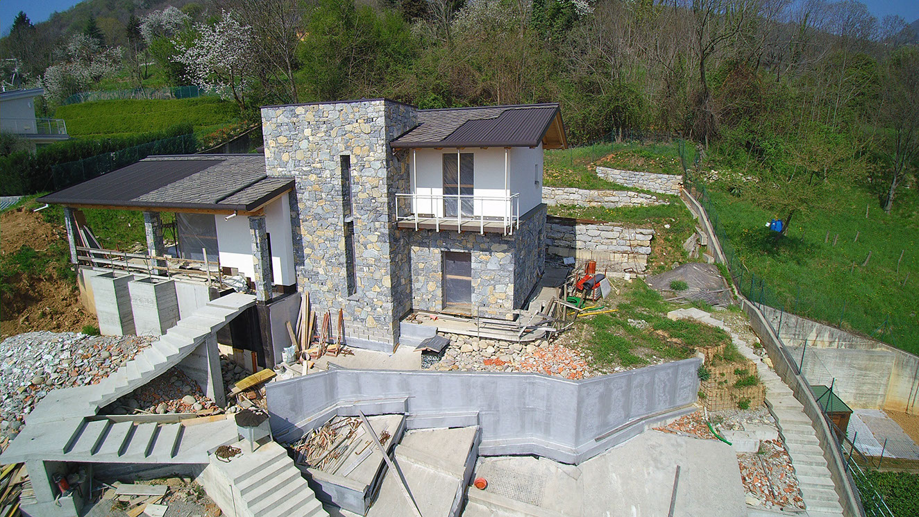 villa struttura legno rivestimento pietra