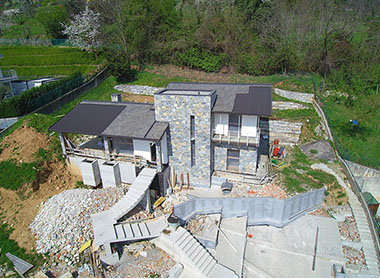 villa struttura legno rivestimento pietra