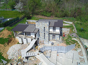 villa struttura legno rivestimento pietra