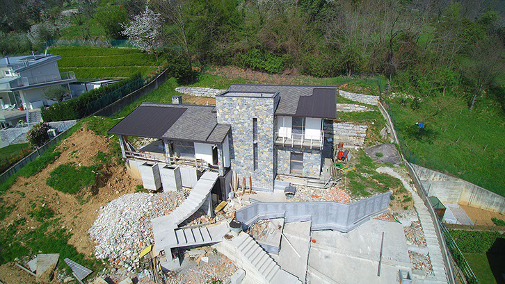 villa struttura legno rivestimento pietra