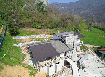 villa struttura legno rivestimento pietra