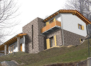 villa struttura legno rivestimento pietra fotoinserimento
