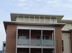 mattoni vista condominio vetro