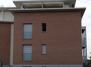 mattoni vista condominio vetro