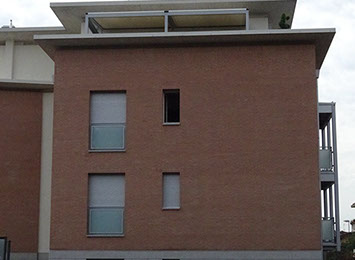 mattoni vista condominio vetro