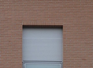 mattoni vista condominio vetro