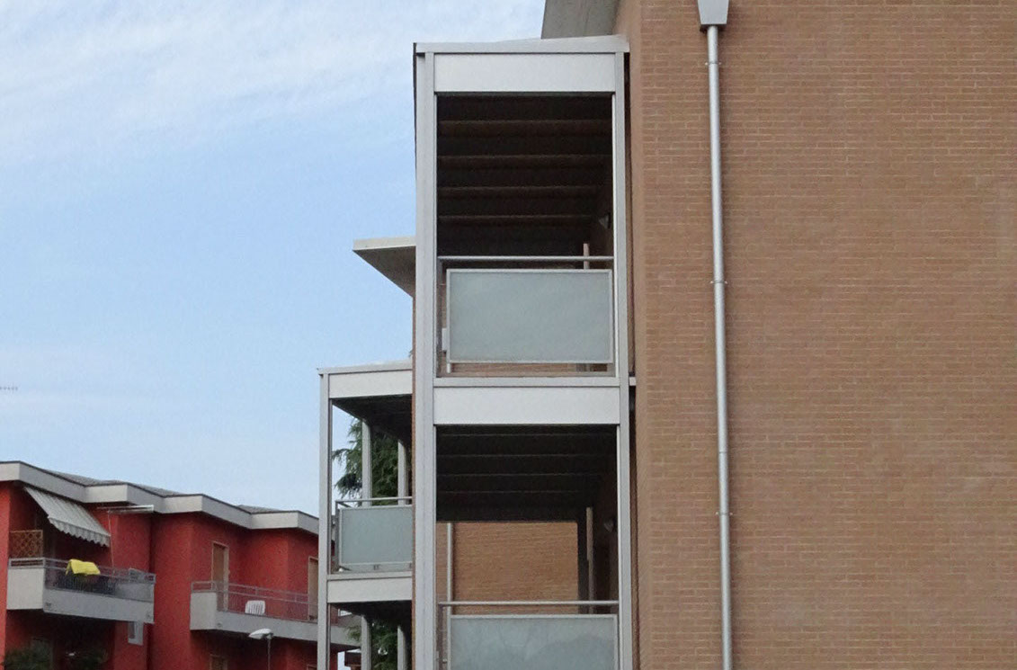 mattoni vista condominio vetro