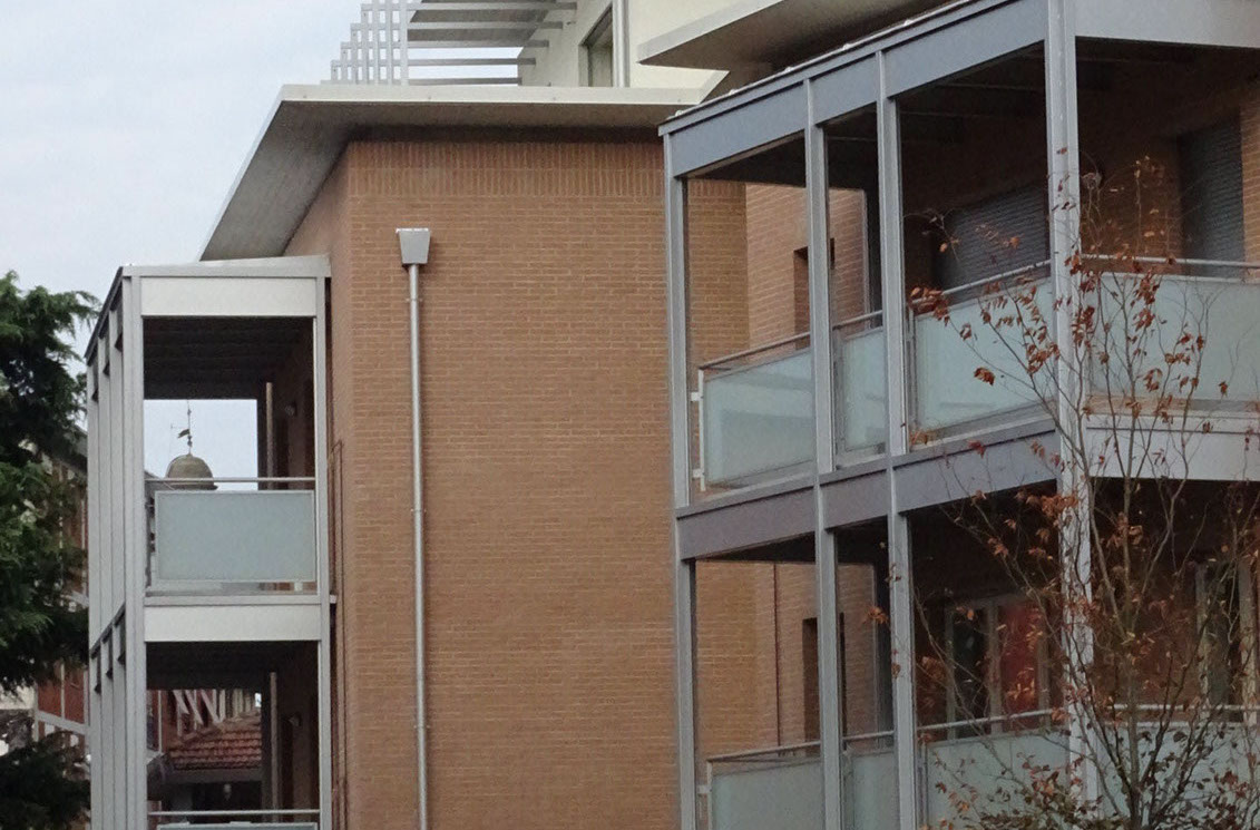 mattoni vista condominio vetro