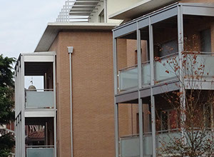 mattoni vista condominio vetro