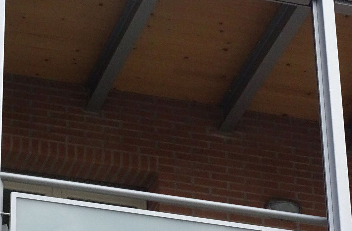 mattoni vista condominio vetro